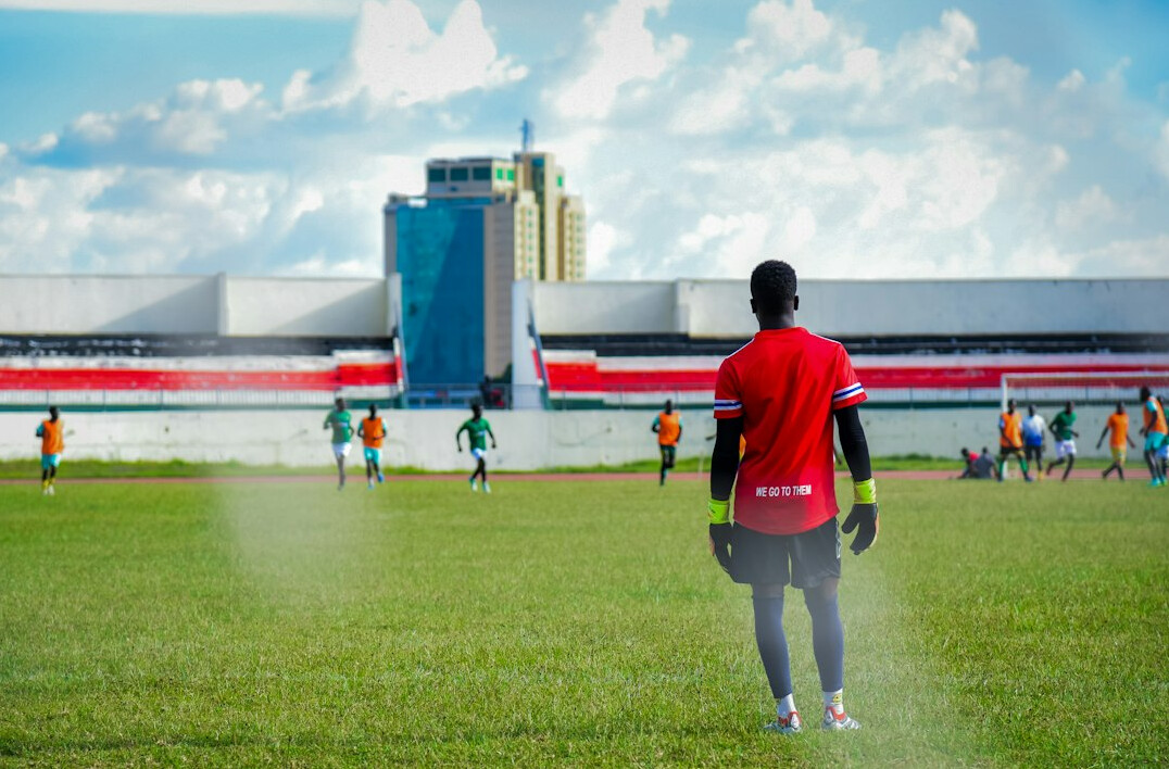 soccer coach on pitch
