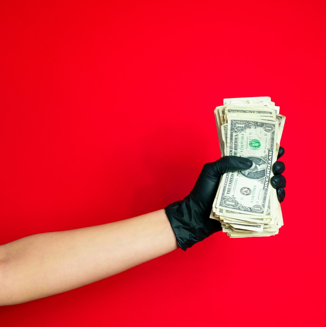 wealthy philanthropist donating fortune