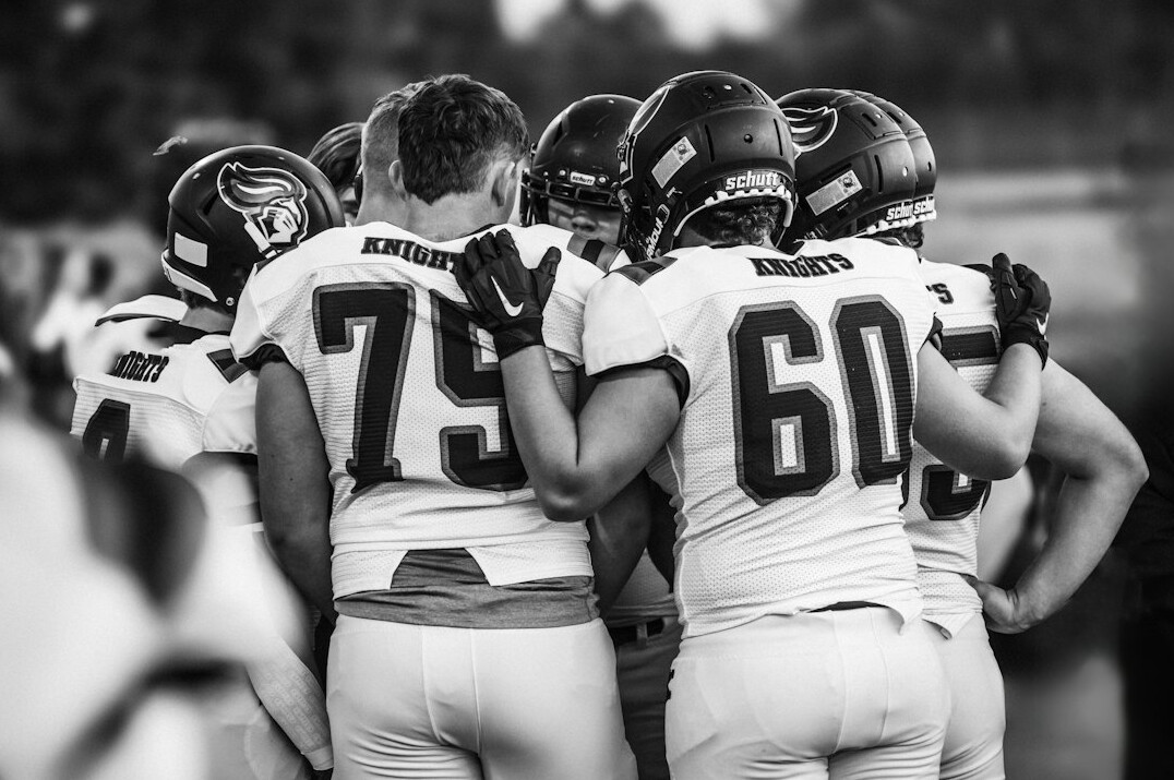 football team huddle